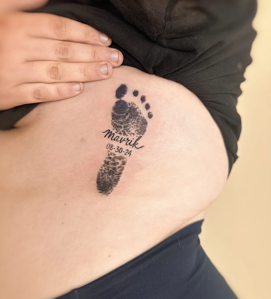 Baby Foot Print Tattoo on Rib