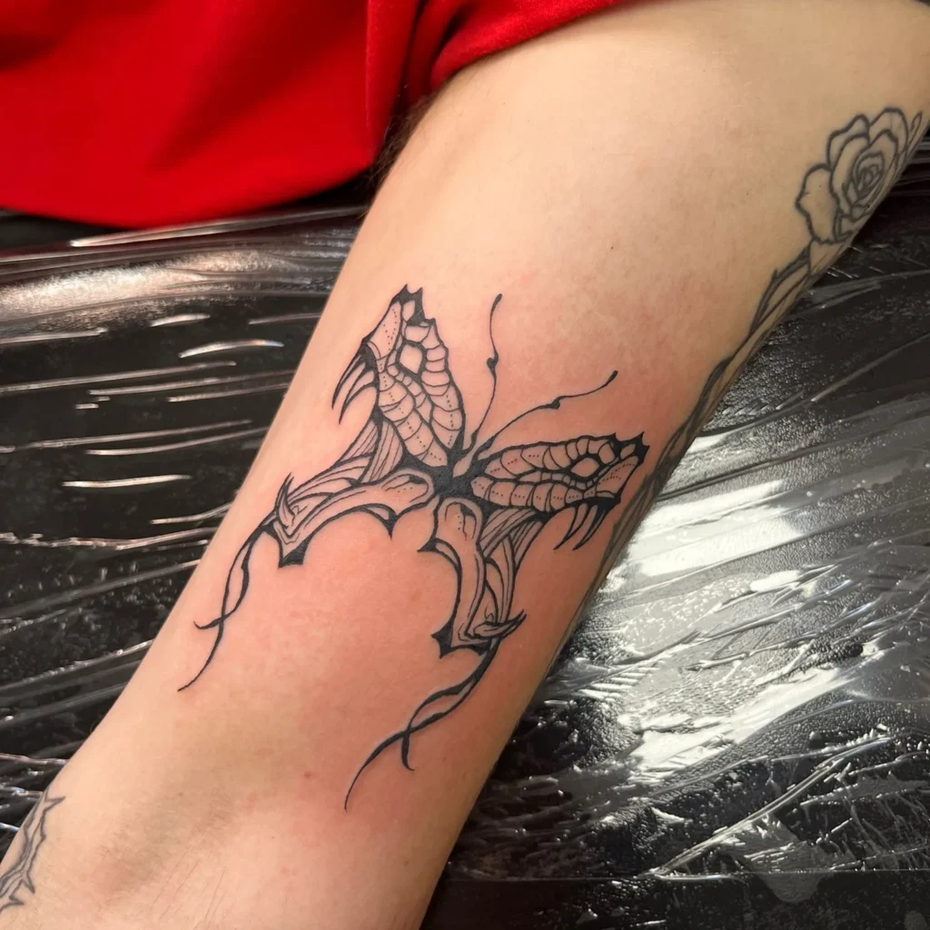 Bold Abstract Butterfly Tattoo