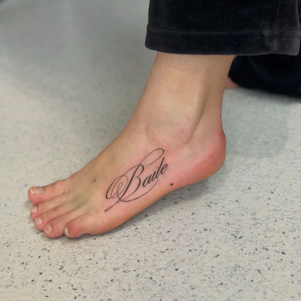 Elegant Calligraphy Script Tattoo