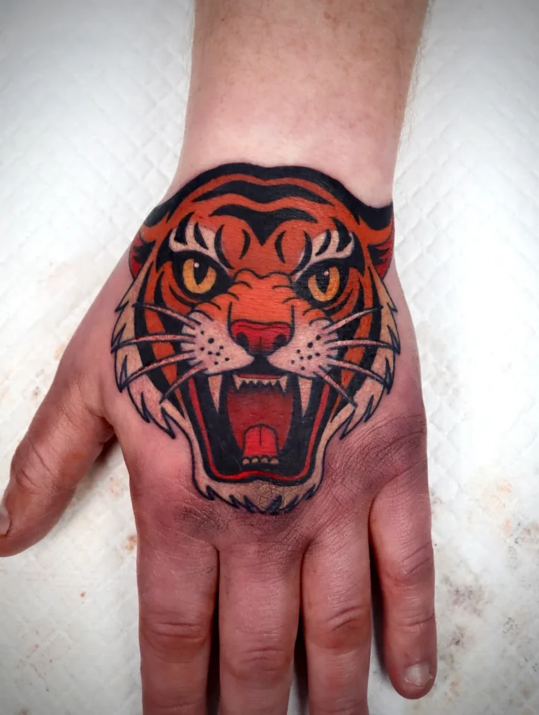 High Contrast Roaring Tiger Hand Tattoo