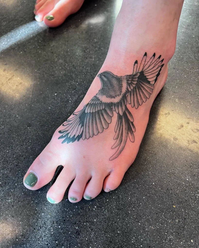 Monochrome Bird in Flight Tattoo