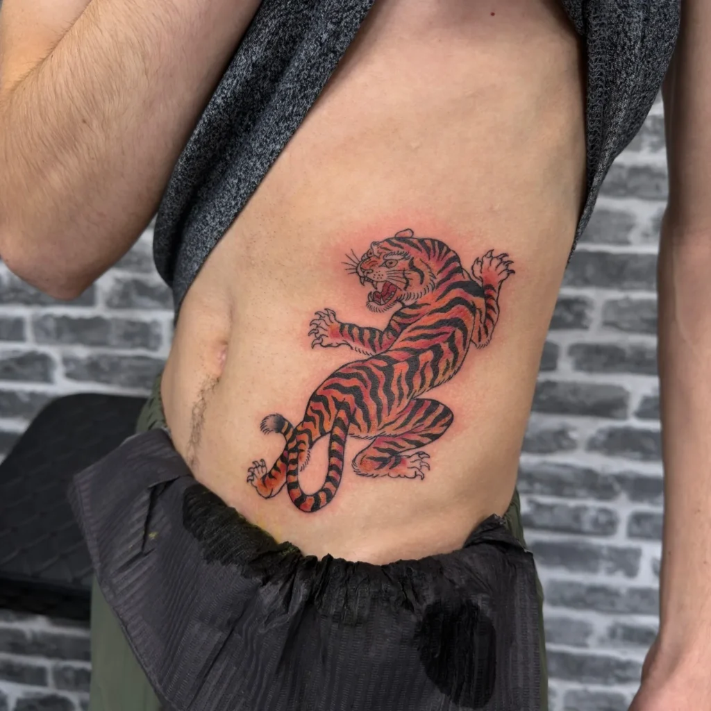 The Dynamic Crawling Rib Tiger Tattoo