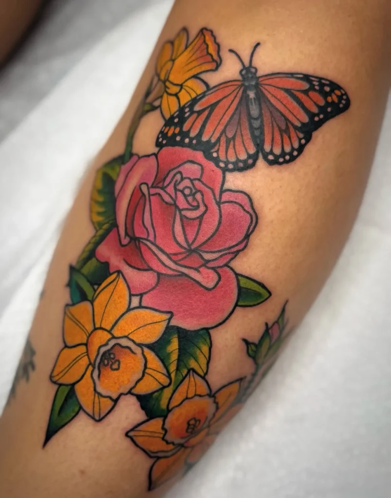 Vibrant Butterfly and Floral Tattoo