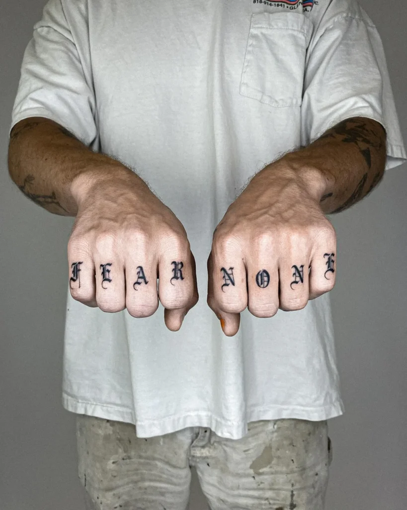 Blackletter Knuckle Typography Tattoo