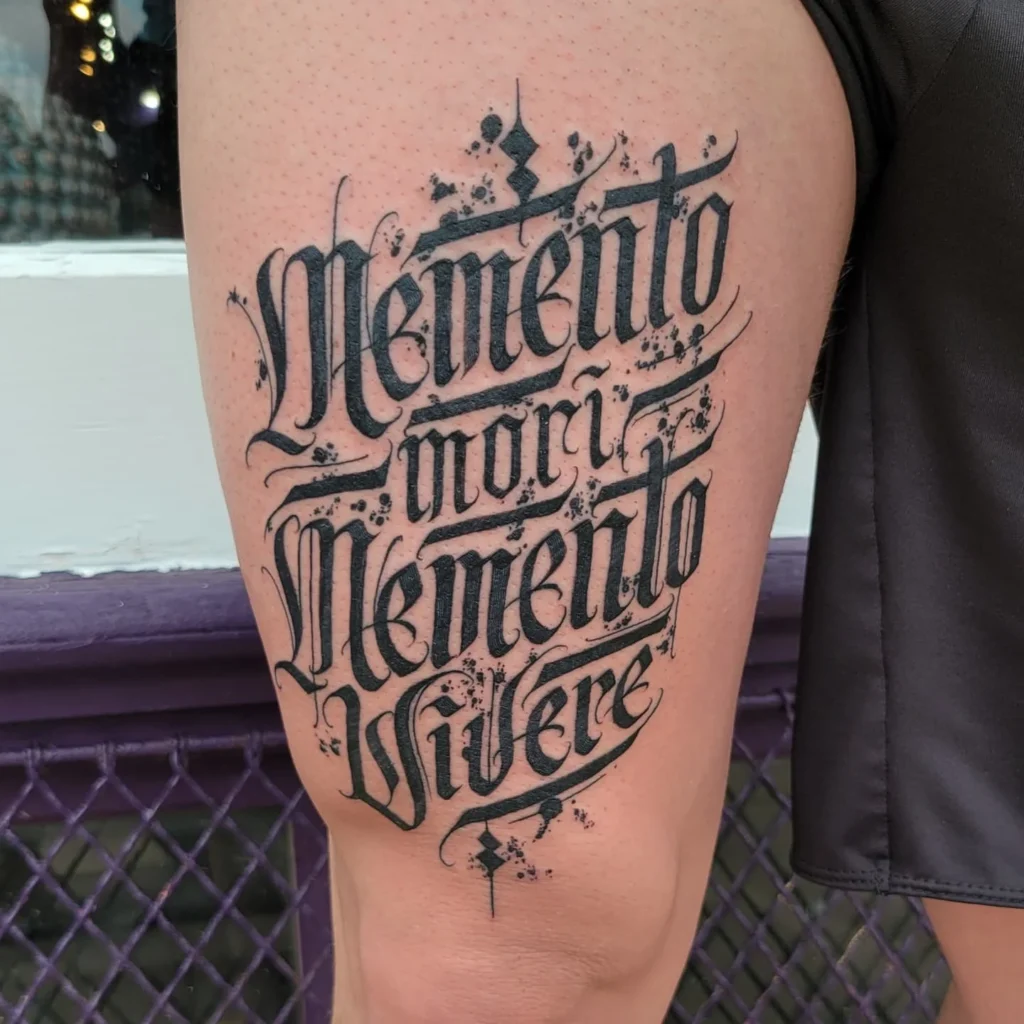 Bold Gothic Calligraphy Tattoo