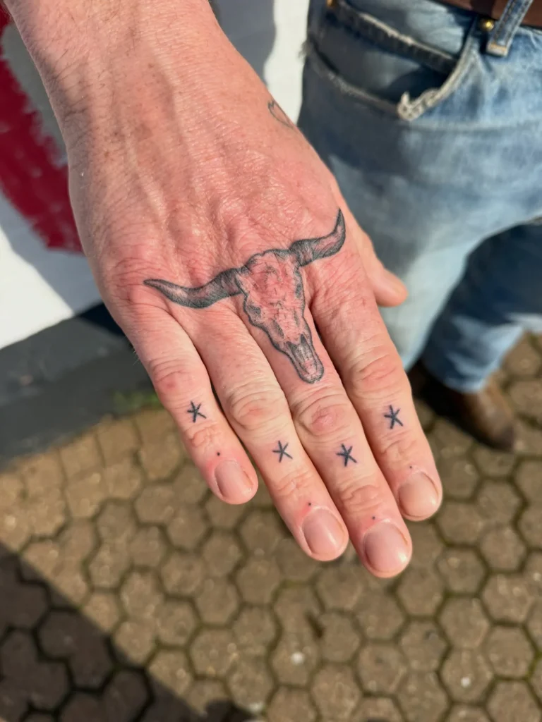 Bull Skull Finger Tattoo