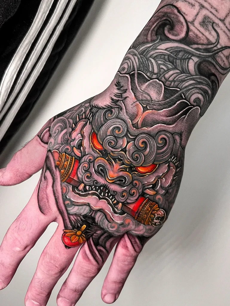 Colorful Japanese Foo Dog Hand Tattoo