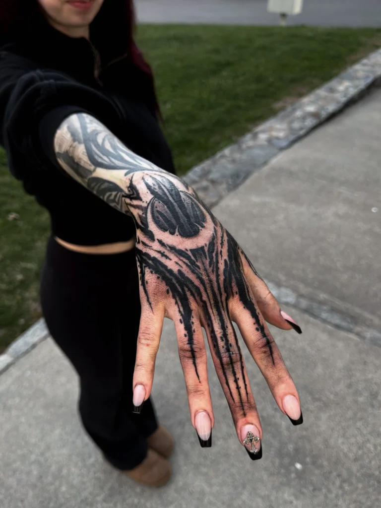 Dark Ornamental Moon Hand Tattoo