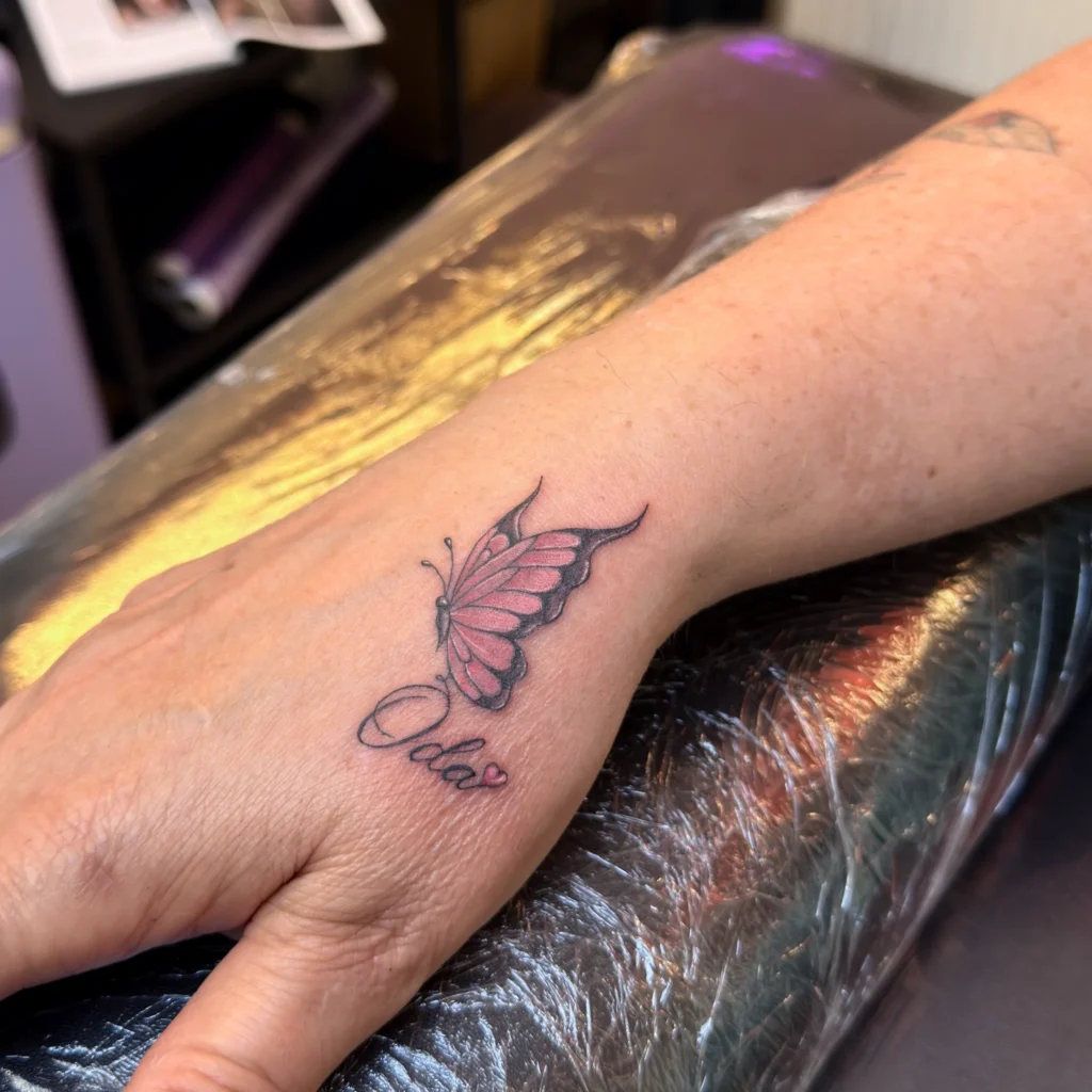 Delicate Pink Butterfly with Script Accent