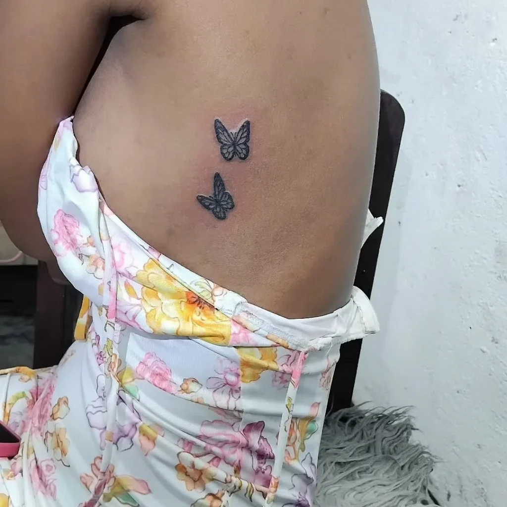 Dual Ribcage Butterflies in Soft Blackwork