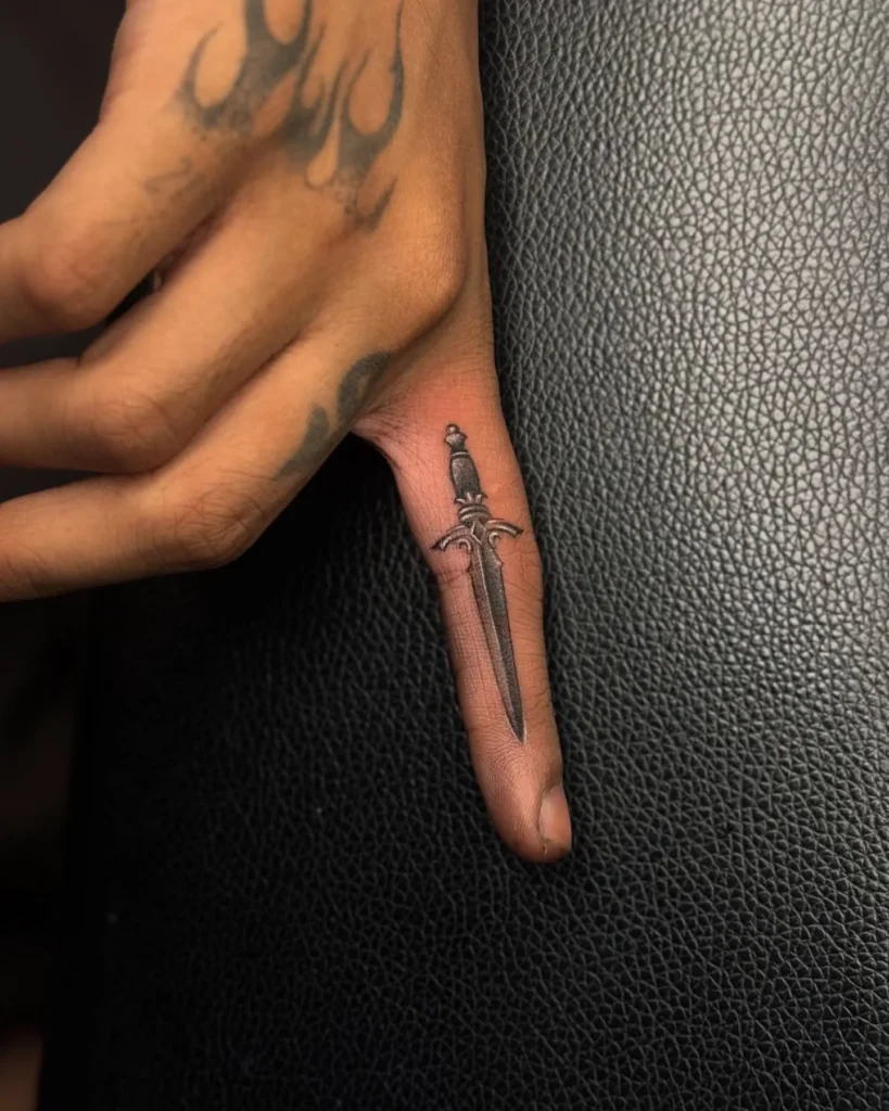 Fine Line Micro Dagger Tattoo