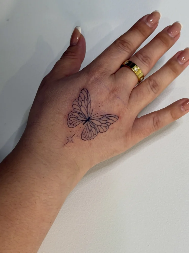 Linework Hand Butterfly Tattoo