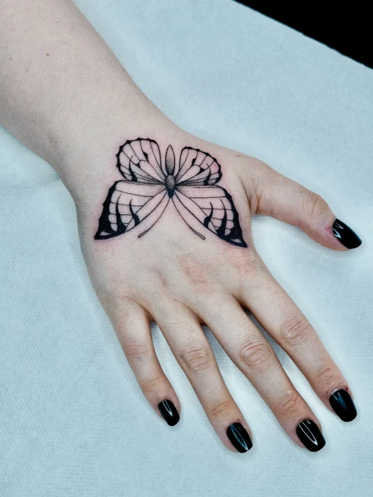 Symmetrical Fine Line Butterfly Tattoo