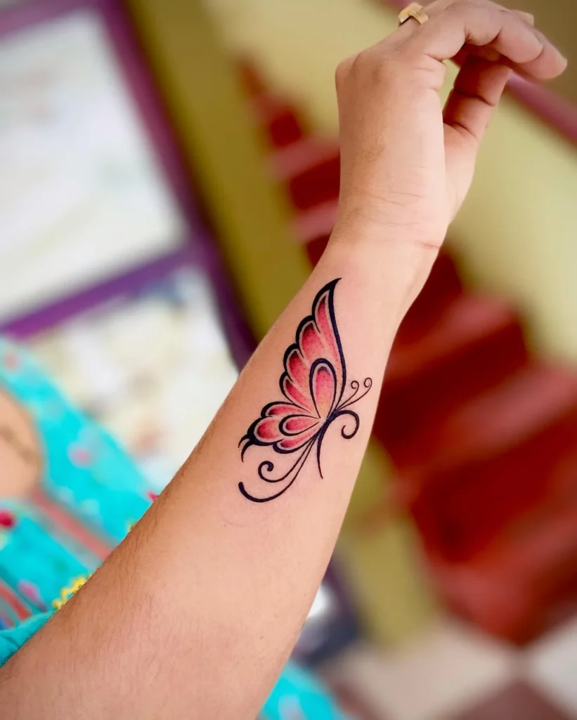 Vibrant Filigree Monarch Tattoo